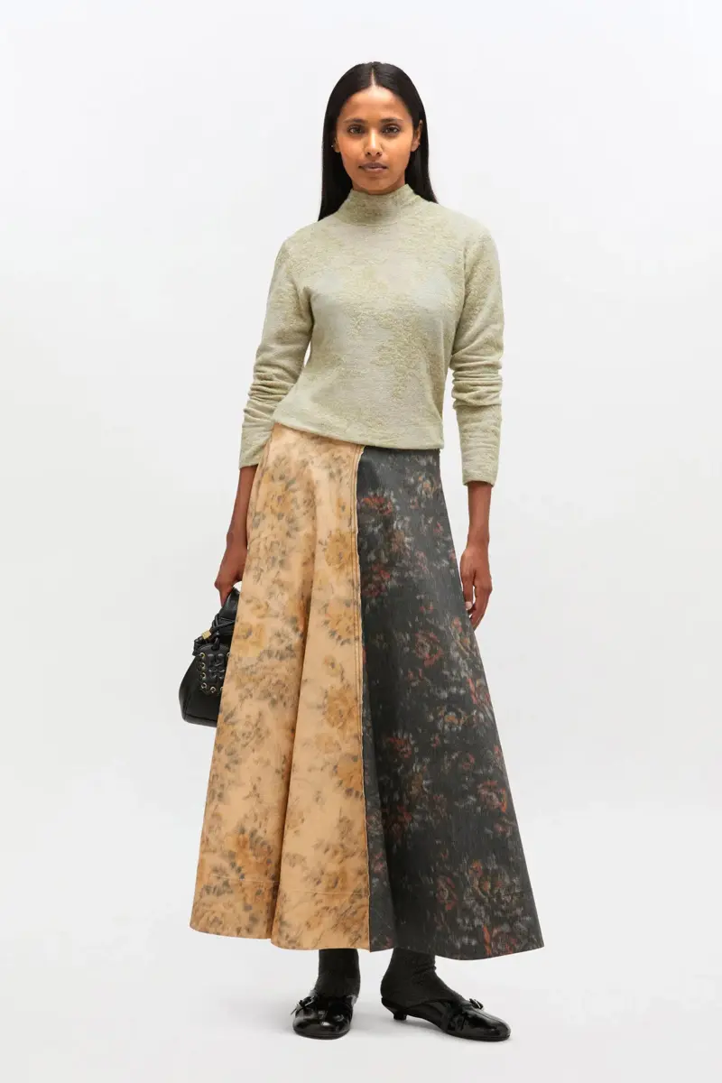 Schwarz-beige Rock mit Blumenmuster Schwarz-beige Rock mit Blumenmuster