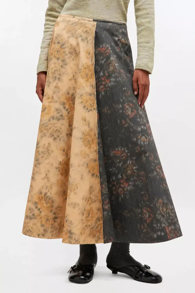 Schwarz-beige Rock mit Blumenmuster Schwarz-beige Rock mit Blumenmuster